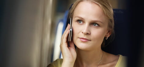 Woman on phone on train